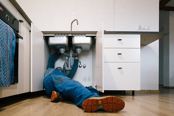 Professional Emergency Plumber technician working in Cambridge, OH